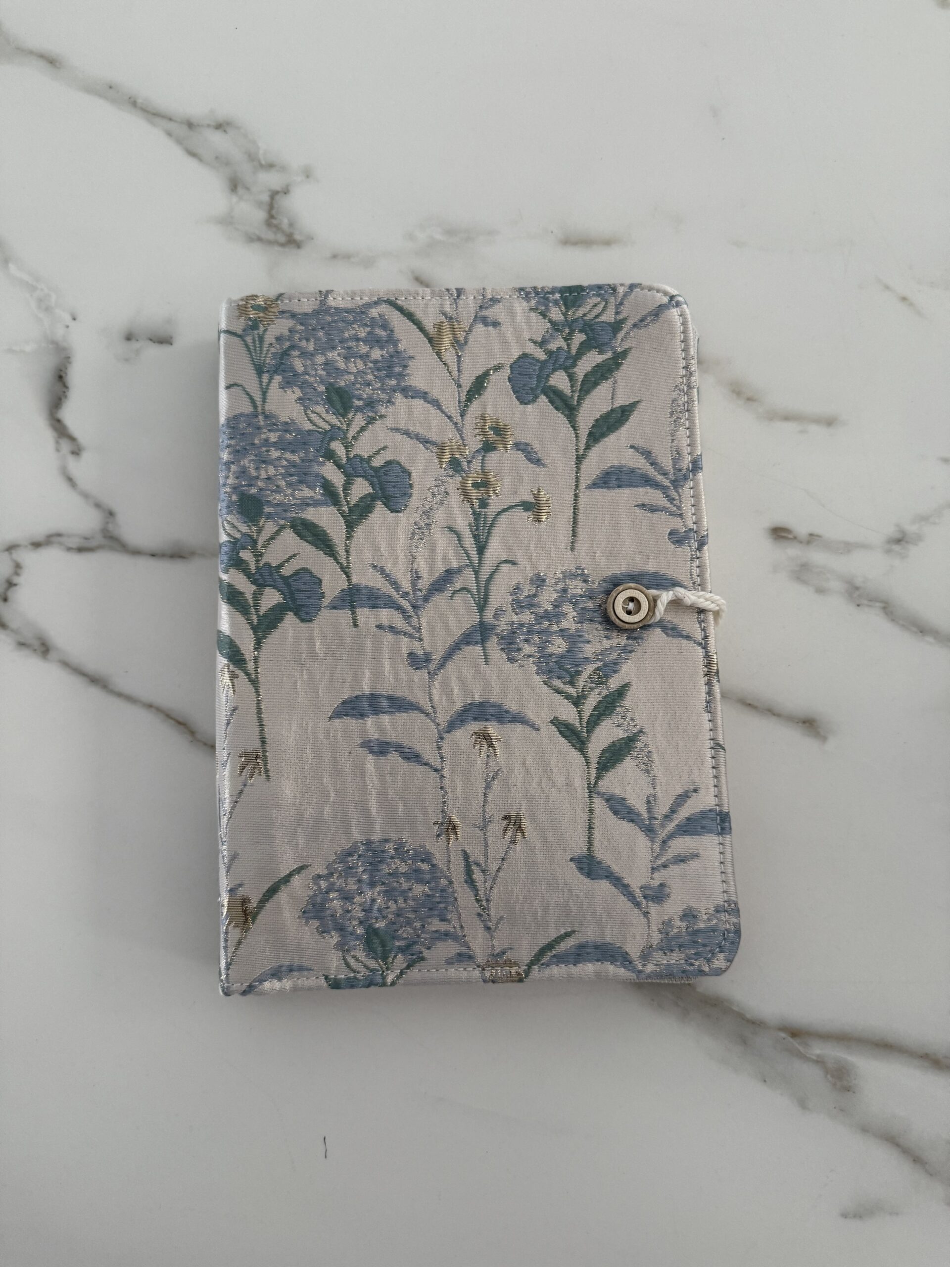 Carnet à anneau en tissu bleu